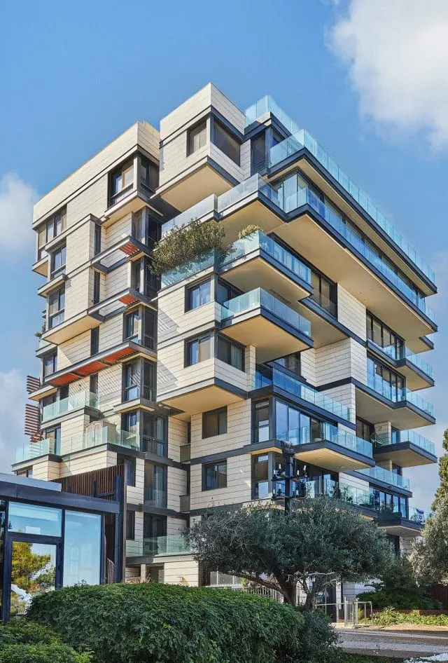 luxurious-house-with-balconies-on-boulevard-near-the-sea-with-green-spaces-e1710899017455-min real-estate-agent-min