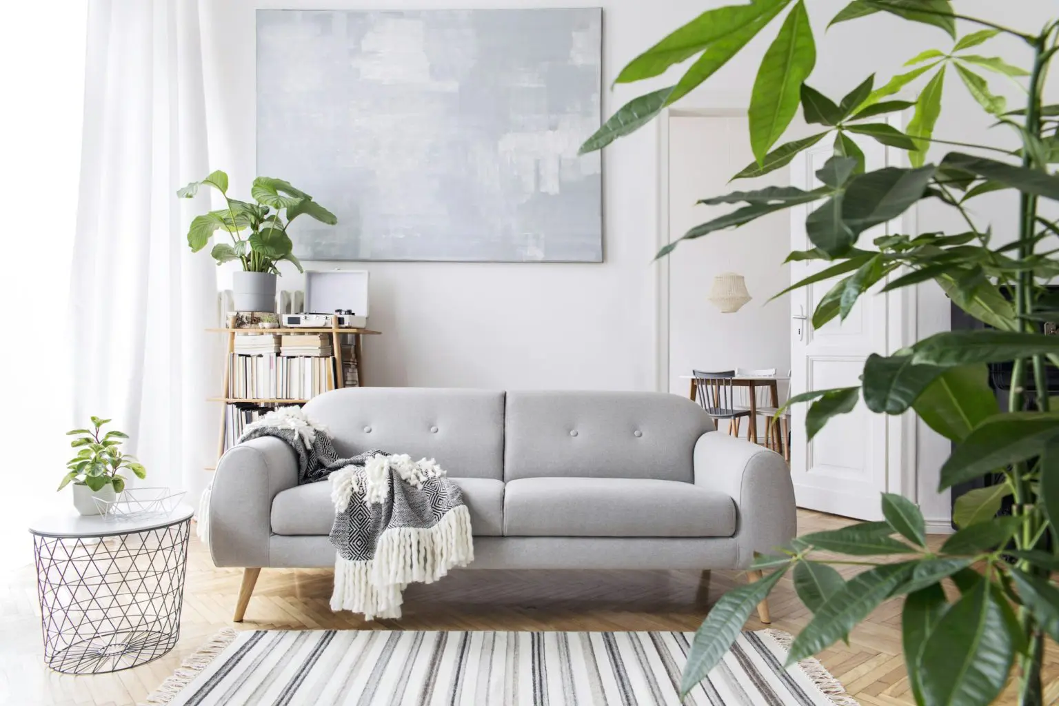modern-scandianvian-living-room-interior-with-design-sofa--1536x1024 real-estate-agent-min